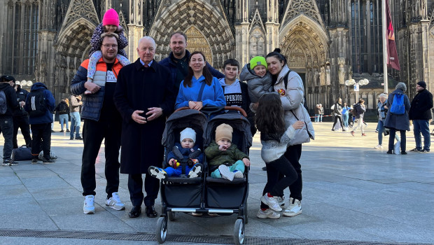John Herbert and the two Ukraine families in Cologne.