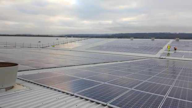 Solar panels going on the roof of the Screwfix distribution centre in Trentham.