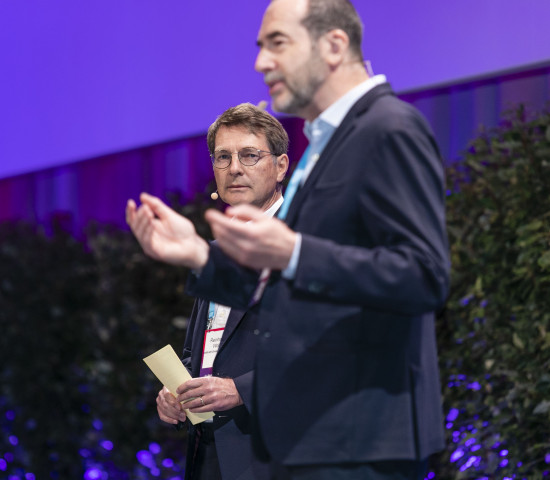 The presidents on stage: Reinhard Wolff (l.) and Thierry Garnier.