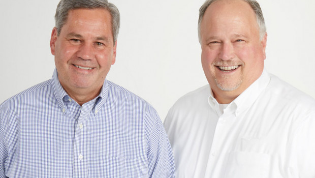 Gary Nackers (r.), former vice-president of lumber and building materials at Do it Best, has retired after handing his responsibilities over to Russ Kathrein.